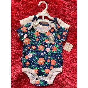 TWO BABY FLORAL AND PLAIN ONESIES